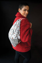 Load image into Gallery viewer, Philip backpack. A free PDF pattern featuring drawstring closure with pockets inside and outside. Available in two sizes. Full size and half pint. Philip is the perfect companion to all of you adventures.