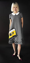 Load image into Gallery viewer, George tent dress sewing pattern. Designed by an independent pattern company. View B is collarless and sleeveless. Sample is made with blue and white striped knit jersey. Front view.