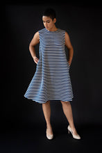 Load image into Gallery viewer, George tent dress sewing pattern. Designed by an independent pattern company. View B is collarless and sleeveless. Sample is made with blue and white striped knit jersey. Front view.